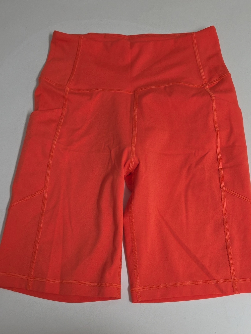 Figs Women’s High-Waist Performance Shorts — Bright Coral
